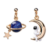 odd pair astronaut with moon earrings in gold