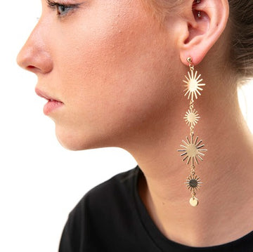 magical stars drop earrings in gold tone
