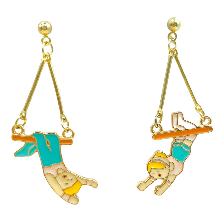 Odd pair Trapeze earrings in drop style