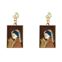 Girl With A Cat Earring" Painting in gold tone