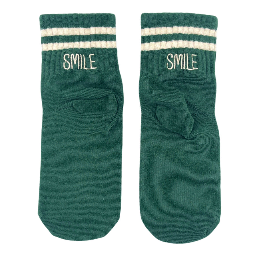 Green & white socks with "SMILE" word embroidered