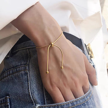 Beautiful adjustable bracelet in gold tone