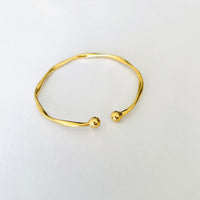Twisted bangle - silver / gold