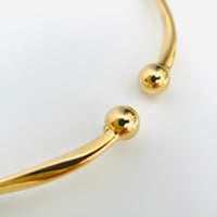 Twisted bangle - silver / gold