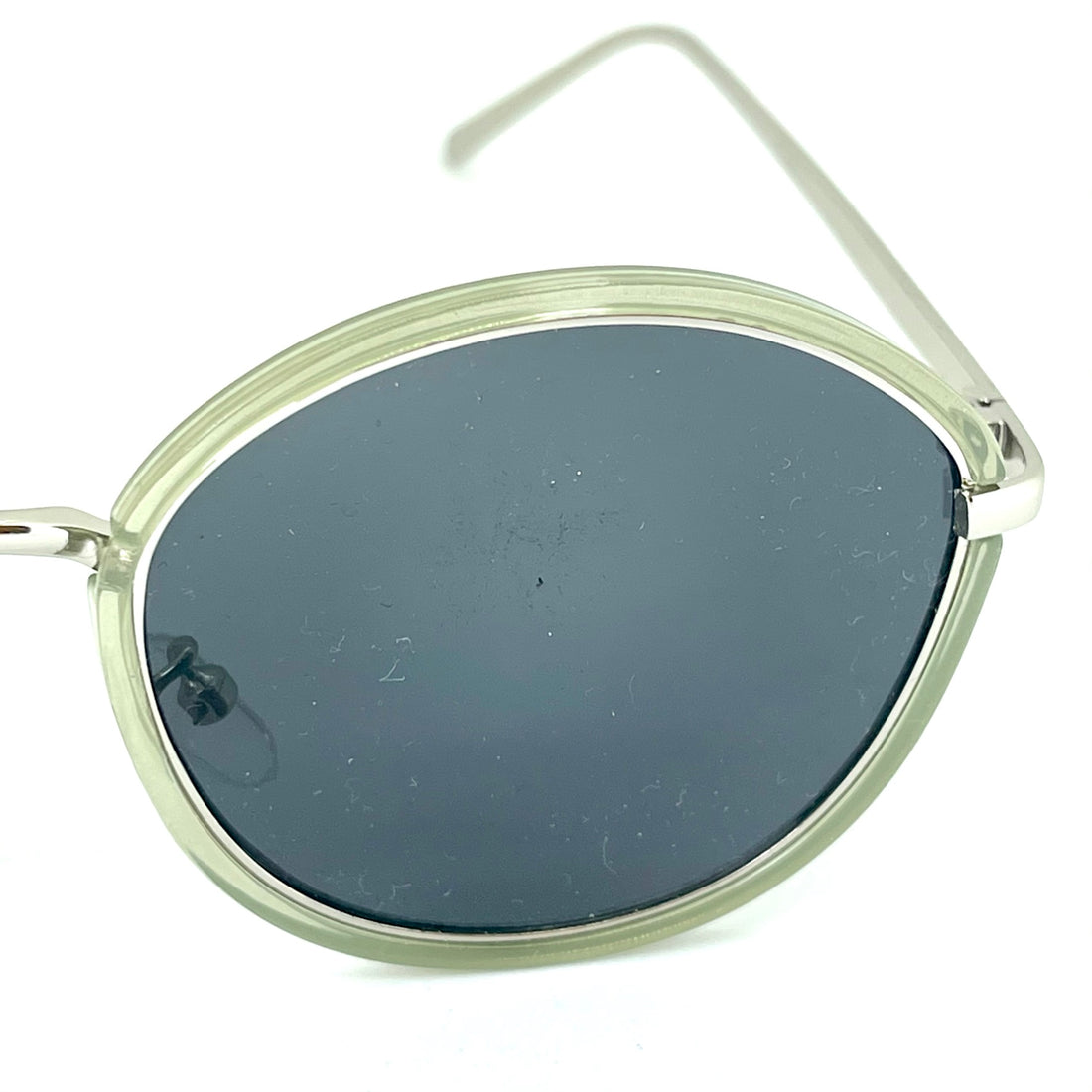 clear green sunglasses with dark tinted lens in silver