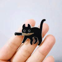 Dangerous cat brooch