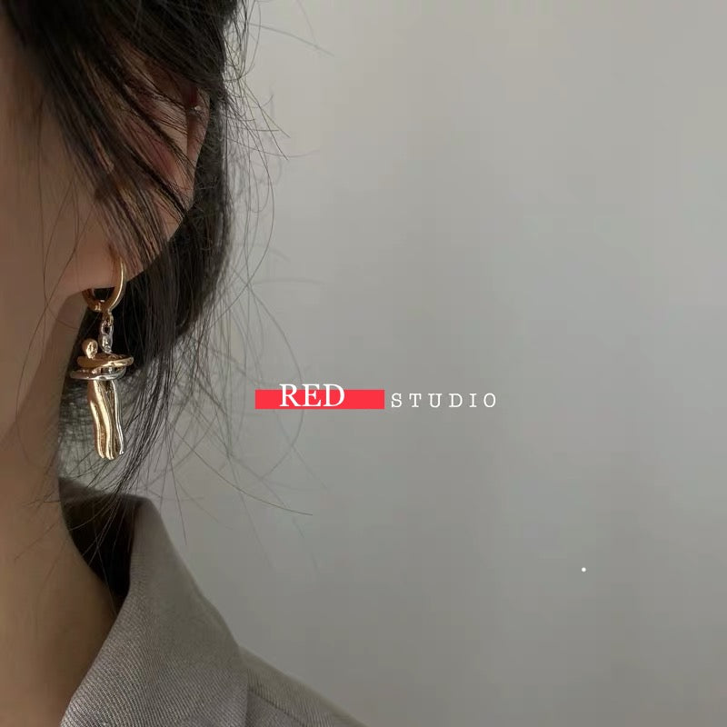 Embrace Huggie Earrings