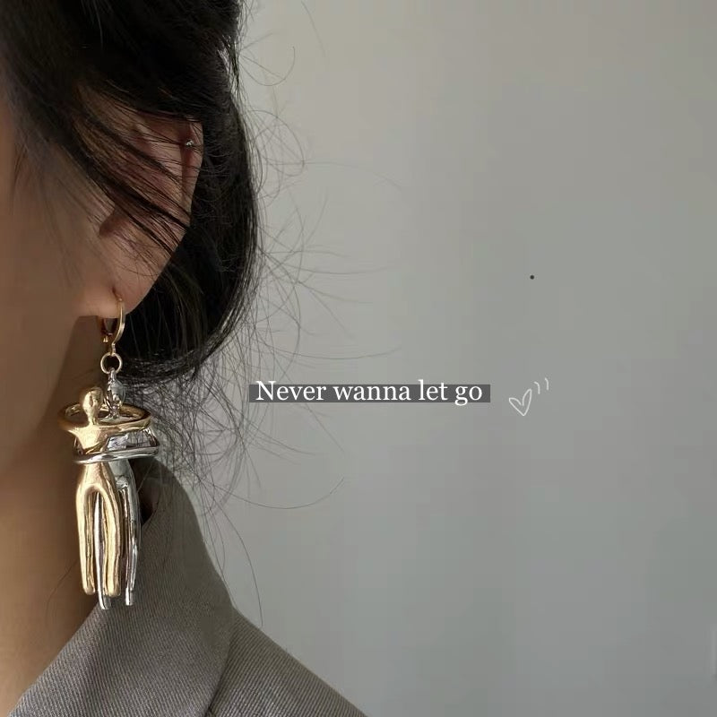 Embrace Huggie Earrings